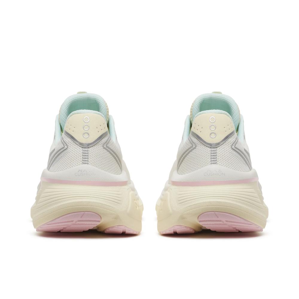 A pair of Saucony Hurricane 26 Womens running shoes shown from the back, featuring a cream-colored sole, a white mesh upper, a light mint green collar, and a soft pink outsole accent.