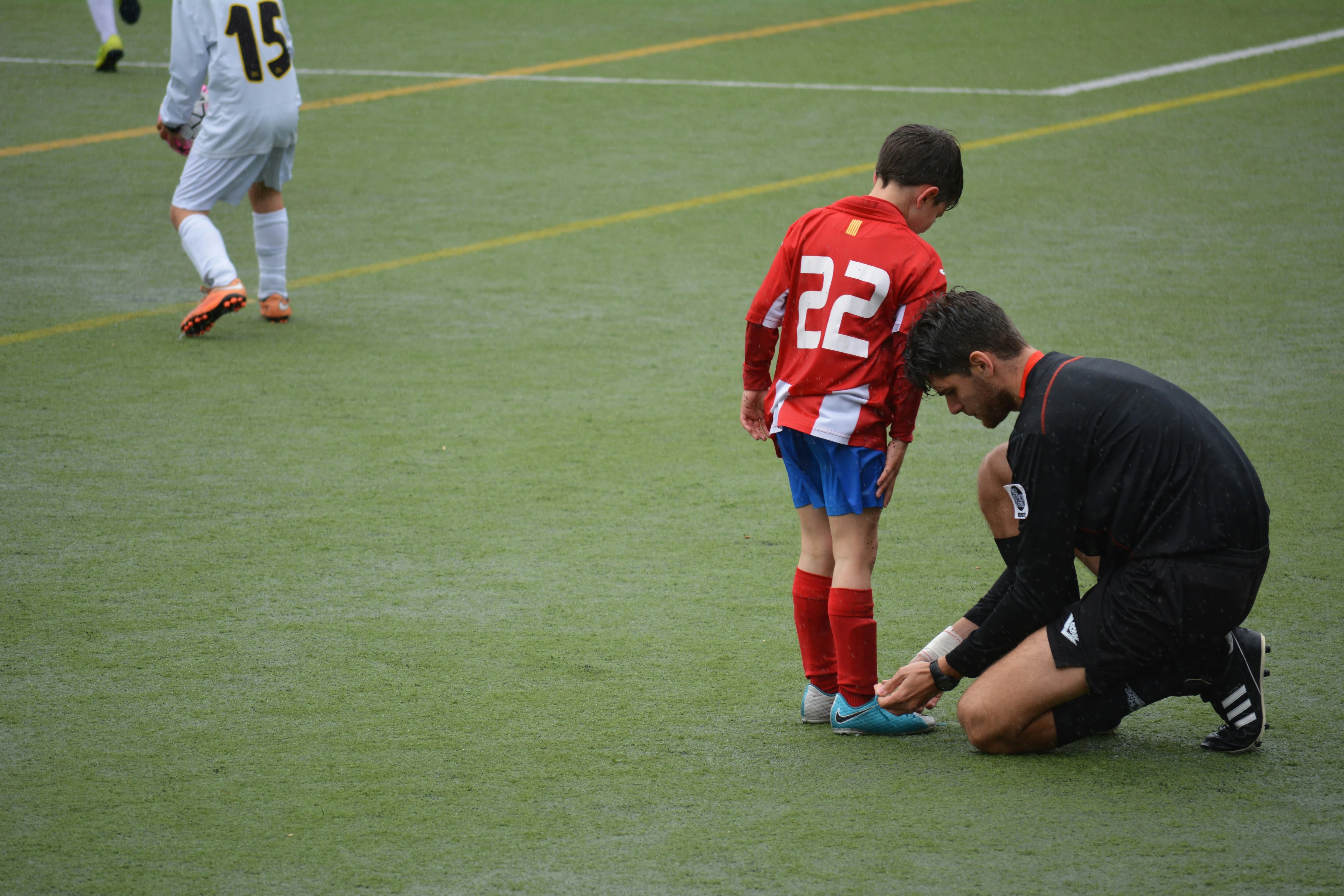 Child playing football