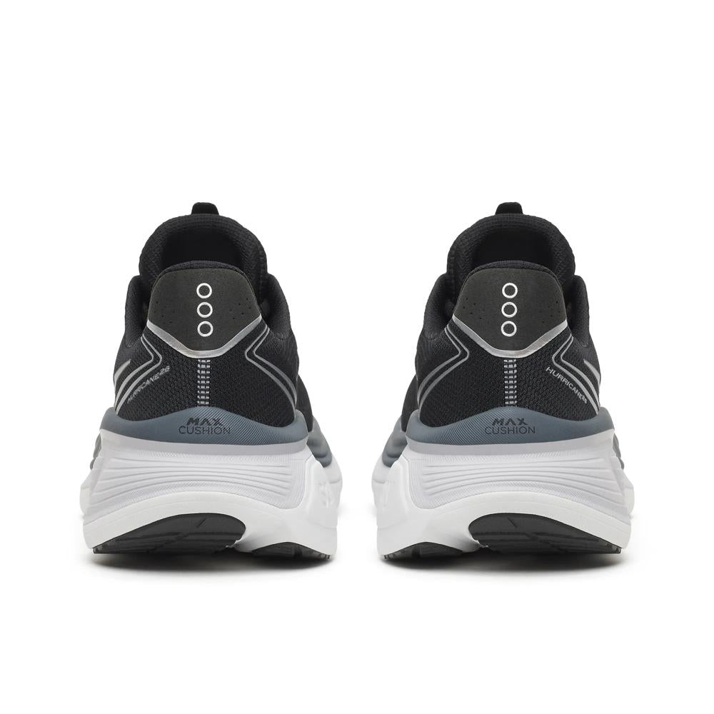 A pair of Saucony Hurricane 26 Mens Running Shoes - Black/Silver shown from the back, featuring a black mesh upper, gray heel accents, and a thick white cushioned sole.