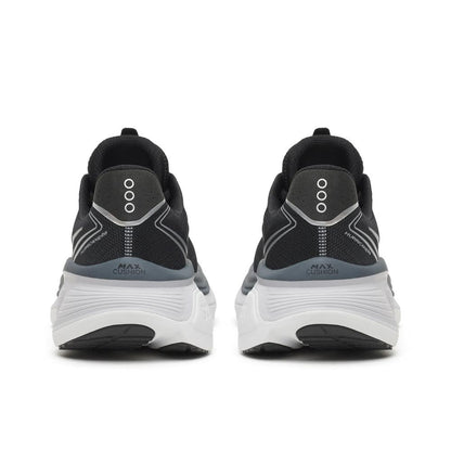A pair of Saucony Hurricane 26 Mens Running Shoes - Black/Silver shown from the back, featuring a black mesh upper, gray heel accents, and a thick white cushioned sole.