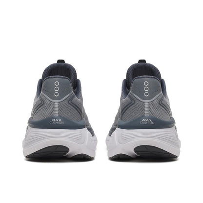 A pair of Saucony Hurricane 26 Mens Running Shoes - Cinder/Gunmetal shown from the back, featuring a textured mesh upper, three circular cutouts on the heel, and a thick white and gray cushioned sole.