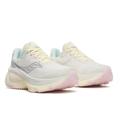 A pair of Saucony Hurricane 26 Womens running shoes in a pastel colorway, featuring a cream and off-white mesh upper with light yellow laces, pale mint green lining, and soft pink accents on the toe caps and midsole.