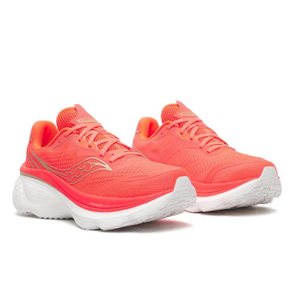 Pair of Saucony Hurricane 26 Womens Running Shoes - Vizired white soles on a white background
