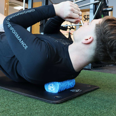 Image of foam roller being used on back
